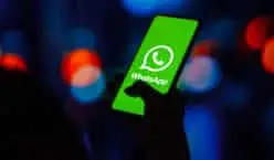 In this photo illustration, the WhatsApp logo is displayed on a smartphone screen